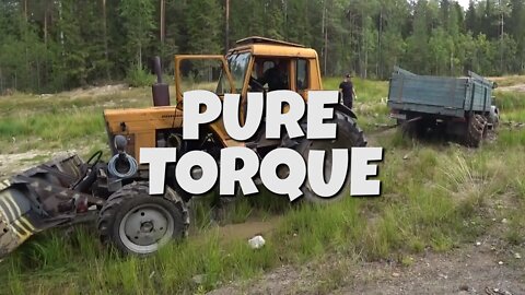 TRACTOR WITH AMAZING TORQUE PULLS HEAVY DUTY TRUCK OUT THE MUD