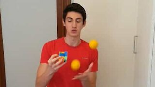 Juggler solves Rubik's Cube and says Pi at the same time!