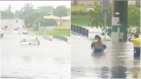Woman gets rescued from her flooded car