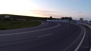 Driver shows off drifting skills on winding road