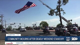 Community mourns after deadly weekend standoff