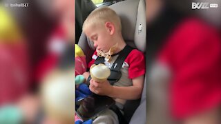 Kid dozes off while eating ice-cream