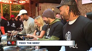 Browns players help to 'Feed the Need' with turkey dinners for those in need at Town Hall Restaurant in Ohio City