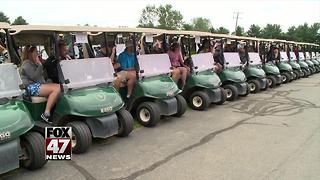 Golfers raise money to buy shoes for kids