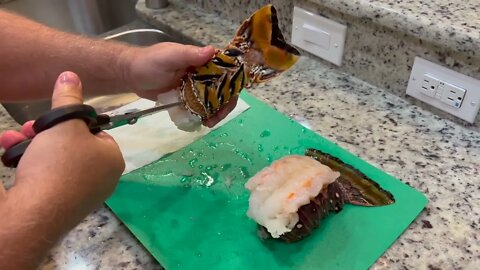Preparing Lobster Tails on top of shell