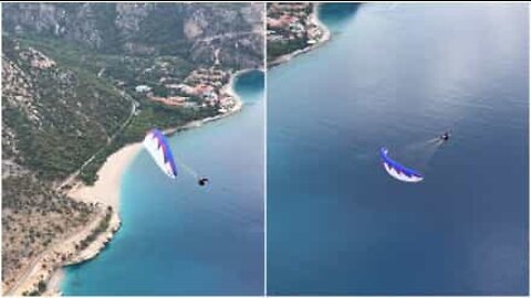 Acrobatic paragliding above the Oludeniz cliffs in Turkey