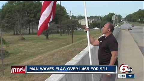 Indianapolis man waves flag over I-465 for 9/11