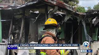 Crews investigate house fire in Fort Pierce