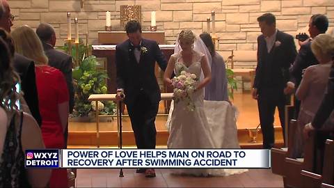 Paralyzed man walks down the aisle on wedding day after being told he may never walk again