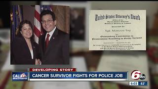 Breast cancer survivor fights for job as police officer
