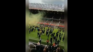 Pitch invasion at Old Trafford before Manchester United vs Liverpool game