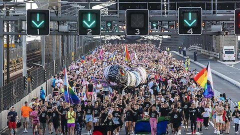 Gay people walk across bridge. Nation erupts into applause.