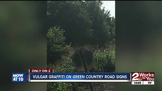 Vulgar graffiti on Green Country road signs