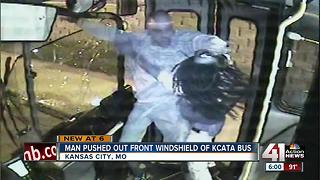 Video shows man pushed through city bus window
