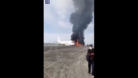 AT THE AIRPORT IN CHONGQING, CHINA, A PLANE WITH 122 PEOPLE ON BOARD ROLLED OUT OF THE RUNWAY AND CAUGHT FIRE