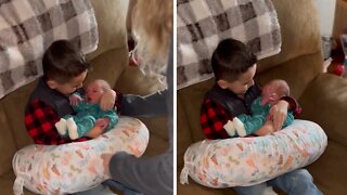 Mom Captures The Moment Her Newborn Is Introduced To Her Stepson