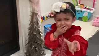 Toddler horrified by arrival Santa on Christmas Eve