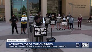 Community groups deliver petitions to County Attorney's Office