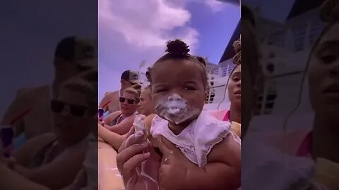 Baby eats ice cream for the first time