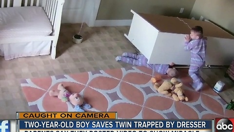 2-year-old boy saves twin brother from fallen dresser