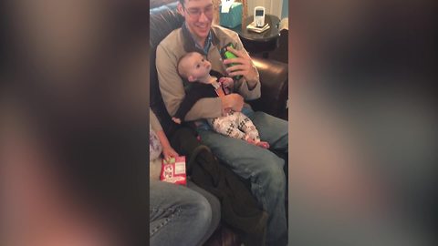 Funny Baby Girl Gets Curious About Her Dad’s Phone