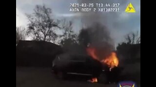 Video: AZ police officer rescues person from SUV fire
