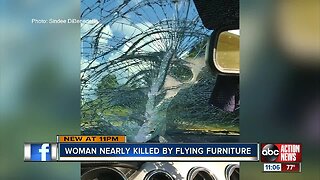 Unsecured furniture smashes driver's windshield after falling off pickup truck in Polk County