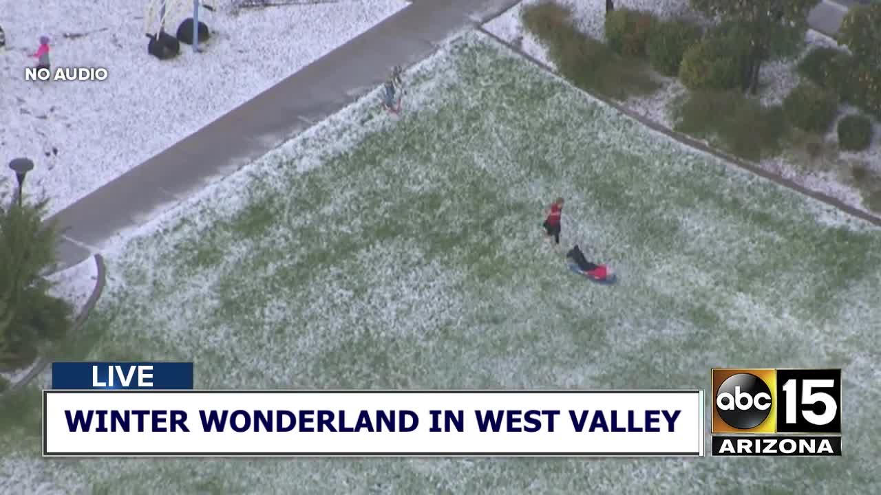 What a sight! Kids go sledding near Phoenix after storms drop a lot of hail