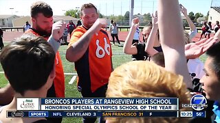 Broncos players visit Rangeview High School