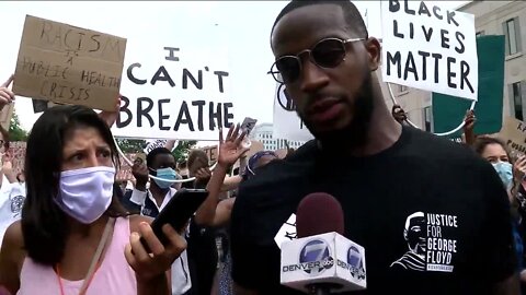 'If you ain't with us, you against us:' Broncos players join protests, lead march through Denver