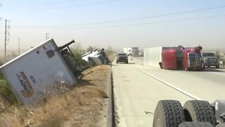 High winds topple trucks in California