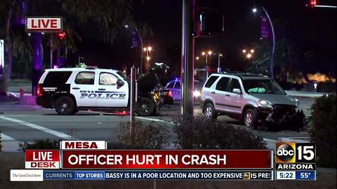 Mesa officer hurt in crash Tuesday morning
