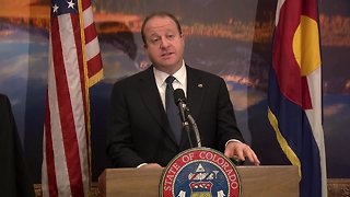 Gov. Jared Polis announces new state logo at press briefing