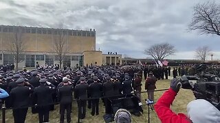 At the funeral for CPD Officer Andrés Mauricio Vásquez Lasso...