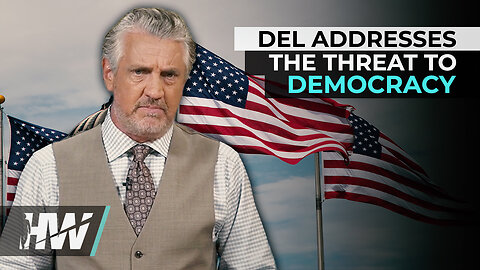 DEL ADDRESSES THE THREAT TO DEMOCRACY