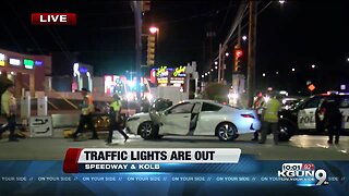 Car crashes into light pole knocking it down on eastside