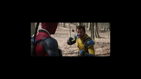 RYAN REYNOLDS helps HUGH JACKMAN with his lines.