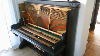 How it looks from the inside, an old piano from 1899