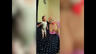 Cute Baby Girl Makes up her Own Game