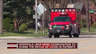 Hospitals overwhelmed with COVID-19 call on state to do more to spread patients out