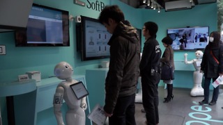 The Humanoid Robot Pepper Serves At A Cell Phone Shop In Tokyo, Japan