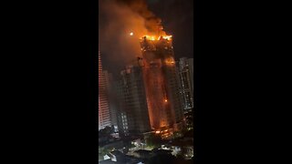 Fire breaks out on top of building in Brazil