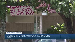 Residents respond to hate signs on front lawn of Livonia home