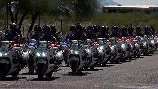 Procession for fallen Arizona officer leaves Pima County