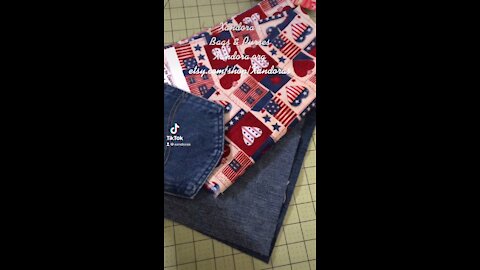 Patriotic-themed fabric with upcycled jeans equals unique bags