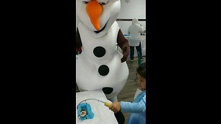 Ice fishing at Christmas party in Katy Texas with Olaf snowman