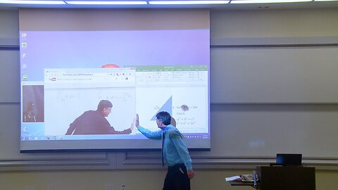Math Professor Fixing Projector Screen