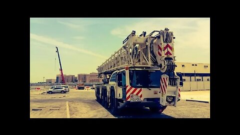 Terex 220 ton capacity crane installing tower crane section