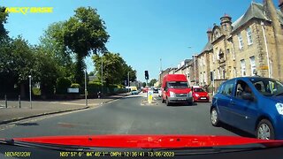 Car running red lights in Greenock 13 06 2023 - 1330