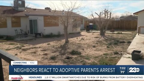 Neighbors react to adoptive parents arrest